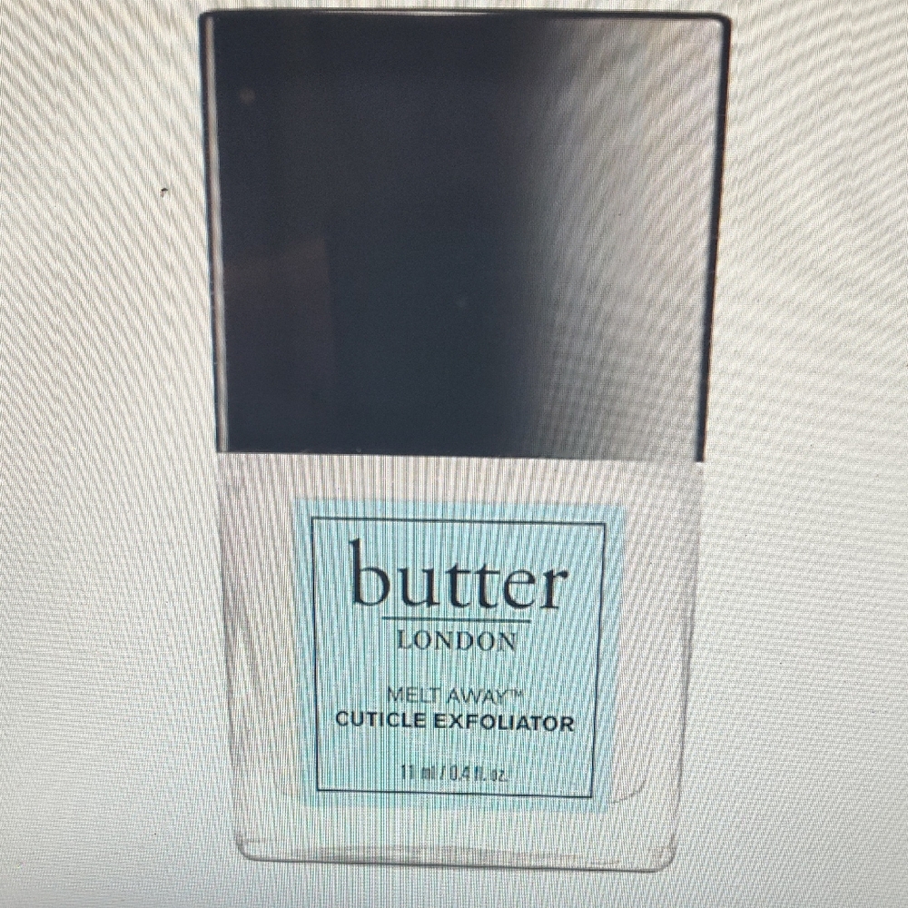 butter LONDON Cuticle Exfoliator with Light Blue Label and Black Cap